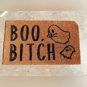 Used outdoor doormat